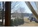 Exterior view with trees highlighting a lovely pond at 63 Radcliffe Ct, Clayton, NC 27527