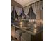 Inviting porch area with stylish furniture, charming lighting, and elegant decorative curtains at 63 Radcliffe Ct, Clayton, NC 27527