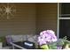 Inviting porch area with cozy seating, stylish decor, and peaceful ambiance at 63 Radcliffe Ct, Clayton, NC 27527