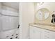 Bathroom with a vanity, granite countertop, and shower-tub combo with black and white tile at 65 Gentle Winds Dr, Chapel Hill, NC 27517