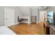 Bedroom featuring a hardwood floor and desk space at 65 Gentle Winds Dr, Chapel Hill, NC 27517