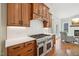 Gourmet kitchen with custom cabinetry, stainless-steel appliances, and open layout at 65 Gentle Winds Dr, Chapel Hill, NC 27517