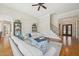 Inviting living room with hardwood floors, staircase, and comfortable seating arrangement at 65 Gentle Winds Dr, Chapel Hill, NC 27517