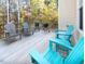 Backyard deck with Adirondack chairs and grill, perfect for entertaining at 7004 Bartons Bend Way, Raleigh, NC 27614
