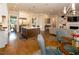 Open kitchen layout with stainless steel appliances, island, and seamless flow into the living area at 7004 Bartons Bend Way, Raleigh, NC 27614