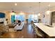 Bright and airy living room with hardwood floors and an open floor plan at 7004 Bartons Bend Way, Raleigh, NC 27614