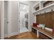 The mud room features a bench and storage in a well-lit space at 7004 Bartons Bend Way, Raleigh, NC 27614