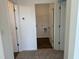 Convenient laundry room featuring connections for a washer and dryer and ample shelving for storage at 71 Furley St, Homesite 116, Sanford, NC 27330