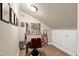 An in-home barbershop with a professional barber chair, mirror, and storage inside this unique space at 80 Thornwhistle Pl, Garner, NC 27529