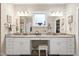 Bathroom features double sink vanity, granite countertops, and a make up vanity at 80 Thornwhistle Pl, Garner, NC 27529