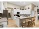 Spacious kitchen featuring granite counters, stainless appliances, a large island, and ample storage at 80 Thornwhistle Pl, Garner, NC 27529