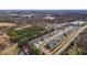 An aerial view of a neighborhood with multiple townhomes and green space at 801 Pryor St # 48, Mebane, NC 27302