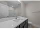 Bathroom featuring a white countertop vanity with undermount sink, modern faucet, and shower in background at 801 Pryor St # 48, Mebane, NC 27302