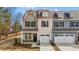 Two-story townhome with a one-car garage and a covered entryway at 801 Pryor St # 48, Mebane, NC 27302