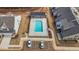 Aerial view of the community pool surrounded by houses, parking, and landscaping at 801 Pryor St # 48, Mebane, NC 27302