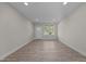 Versatile room with hardwood floors, ample natural light, and a view of the outdoors at 801 Pryor St # 48, Mebane, NC 27302