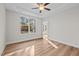 Bright bedroom featuring beautiful hardwood floors and a ceiling fan at 803 Pryor St # 47, Mebane, NC 27302