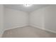 Neutral bedroom with carpet, white trim, and a ceiling light at 803 Pryor St # 47, Mebane, NC 27302