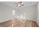 Serene bedroom with ceiling fan, tray ceiling, wood floors and ensuite bathroom at 803 Pryor St # 47, Mebane, NC 27302
