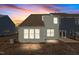 Townhome backyard featuring siding, windows, and small concrete patio at 807 Pryor St # 45, Mebane, NC 27302