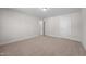 Neutral bedroom features carpeted floors and two access doors at 807 Pryor St # 45, Mebane, NC 27302