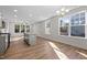 Spacious, open kitchen and living space with hardwood floors and a large island, great for entertaining at 807 Pryor St # 45, Mebane, NC 27302