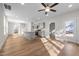 Spacious open-concept living area, complete with hardwood flooring, modern fixtures, and lots of natural light at 807 Pryor St # 45, Mebane, NC 27302