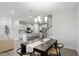 Open-concept dining area adjacent to a modern kitchen, perfect for entertaining and Gathering gatherings at 814 Silo Park Dr, Wake Forest, NC 27587
