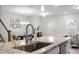 Modern kitchen with a large center island, ample counter space, and contemporary fixtures at 814 Silo Park Dr, Wake Forest, NC 27587