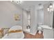 Bathroom features a modern tub and separate shower with a glass enclosure at 9321 Stephenson Adams Ln, Willow Springs, NC 27592