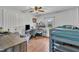 Bedroom with hardwood floors, a bunk bed, and desk setup for a  at 9321 Stephenson Adams Ln, Willow Springs, NC 27592