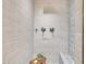 Modern tiled shower with built-in bench and contemporary fixtures at 9321 Stephenson Adams Ln, Willow Springs, NC 27592