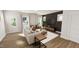 Bright living room filled with natural light and wood floors, and modern decor at 936 Allen Park Dr, Raleigh, NC 27604