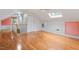 Attic bonus room with hardwood floors, skylight and access to staircase at 112 Parkmeadow Dr, Cary, NC 27519