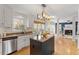 Gourmet kitchen featuring a granite island, stainless steel appliances, and an open layout at 112 Parkmeadow Dr, Cary, NC 27519