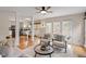 Relaxing living room features natural light, comfortable seating, and an open flow to the kitchen at 112 Parkmeadow Dr, Cary, NC 27519