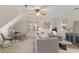 Bright living room features neutral walls, plush seating, and bright natural light at 112 Parkmeadow Dr, Cary, NC 27519