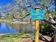 A 'No Trespassing' sign near the community pond, emphasizing the area is exclusively for WestPark residents at 112 Parkmeadow Dr, Cary, NC 27519