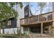 A shot of a deck on the back of the house, with a wooded area in the background at 118 Flora Mcdonald Ln, Cary, NC 27511