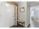 Hallway featuring black tiled floors with the entrance to the kitchen at 118 Flora Mcdonald Ln, Cary, NC 27511