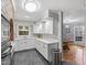 Kitchen with white cabinets and modern appliances at 118 Flora Mcdonald Ln, Cary, NC 27511
