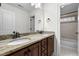 Bathroom with dual sink granite countertop vanity and tile flooring at 1196 Smith Creek Way, Wake Forest, NC 27587