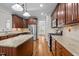 Gourmet kitchen with granite countertops and stainless steel appliances at 1196 Smith Creek Way, Wake Forest, NC 27587
