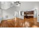 Open concept living room and kitchen with hardwood floors and plenty of natural light at 1196 Smith Creek Way, Wake Forest, NC 27587