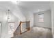 Bright open loft area with high ceilings, natural light, and decorative chandelier at 1196 Smith Creek Way, Wake Forest, NC 27587