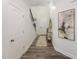Inviting entryway featuring wood floors, white walls, and stylish decor at 1205 Coral Cay Bnd, Wake Forest, NC 27587