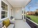 Relaxing screened patio featuring comfortable seating and outdoor access at 1205 Coral Cay Bnd, Wake Forest, NC 27587