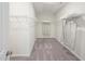 Spacious walk-in closet with carpet and wire shelving providing ample storage for clothing and accessories at 1205 Coral Cay Bnd, Wake Forest, NC 27587
