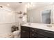 Clean bathroom featuring a glass enclosed shower and double vanity with plenty of counter space at 121 Black Oak Ct, Clayton, NC 27520