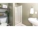 Modern bathroom featuring a walk-in shower, stylish vanity, and minimalist decor at 121 Black Oak Ct, Clayton, NC 27520